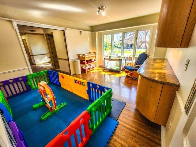 rec room with wood finished floors