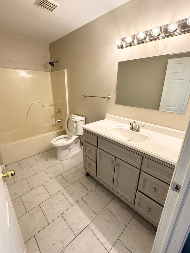 bathroom featuring visible vents, toilet, shower / bath combination, marble finish floor, and vanity