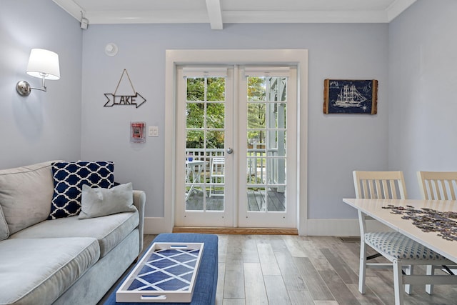 entryway featuring wood finished floors, baseboards, french doors, crown molding, and beamed ceiling