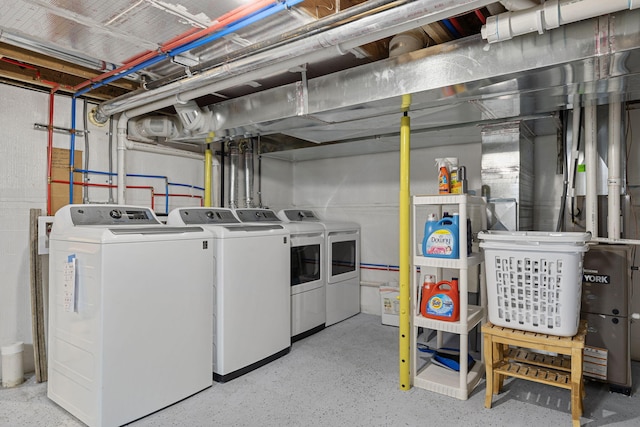 laundry area with laundry area and separate washer and dryer