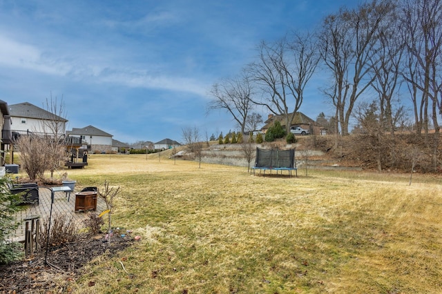 view of yard with a trampoline