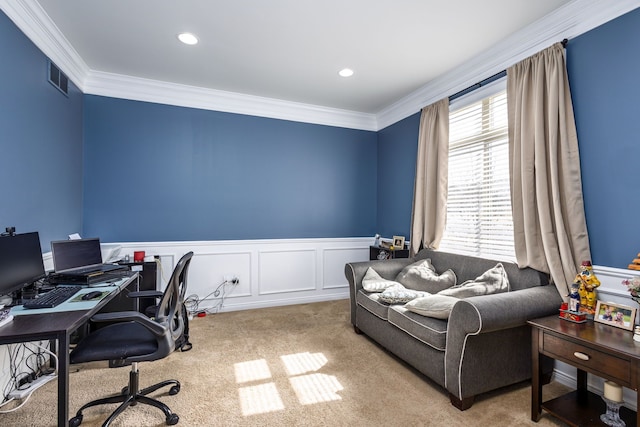 carpeted office space featuring a wainscoted wall, visible vents, and ornamental molding