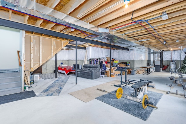 unfinished basement with water heater