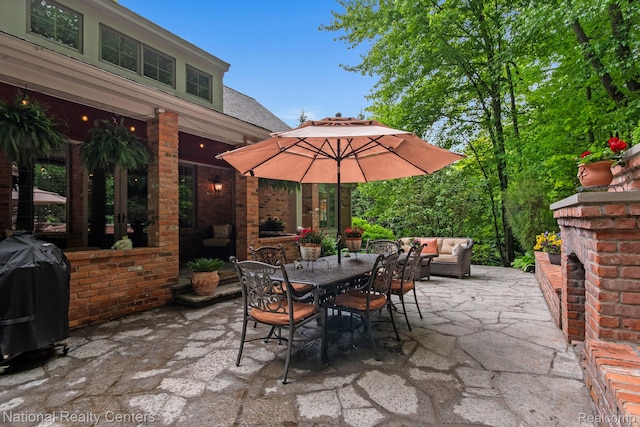 6654 College Park, Clarkston, MI 48346 - view of patio / terrace with outdoor lounge area, outdoor dining space, and grilling area