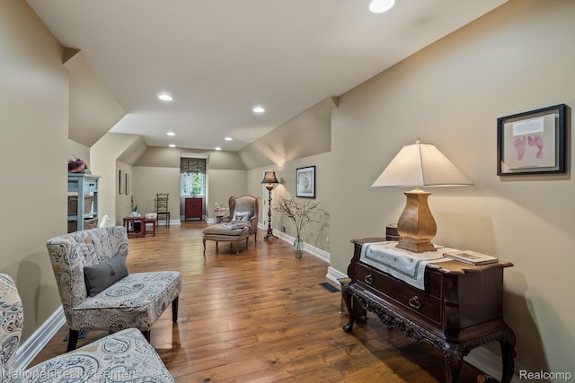 6654 College Park, Clarkston, MI 48346 - sitting room with baseboards, lofted ceiling, hardwood / wood-style flooring, and recessed lighting
