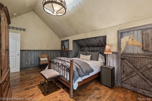 6654 College Park, Clarkston, MI 48346 - bedroom with wainscoting, lofted ceiling, and wood-type flooring