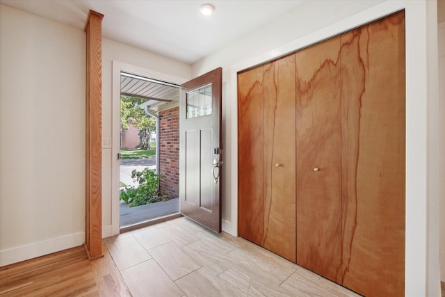 entrance foyer featuring baseboards