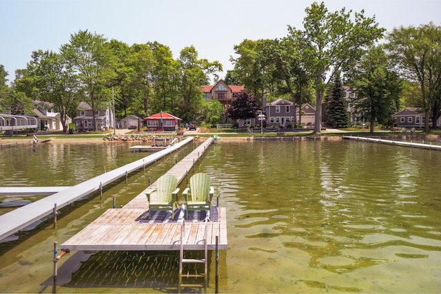 7107 Hallenbeck Hwy, Manitou Beach, MI 49253 - dock area featuring a water view