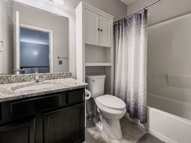 full bathroom with tile patterned floors, shower / tub combo with curtain, toilet, and vanity