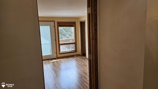unfurnished room featuring wood finished floors