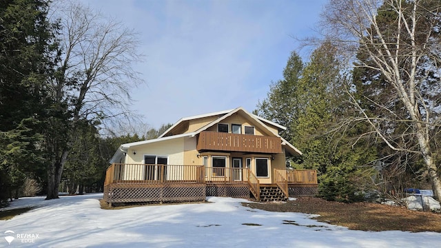 chalet / cabin with a wooden deck