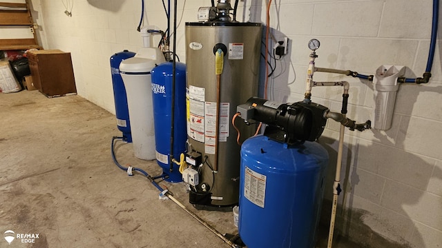 utility room featuring gas water heater