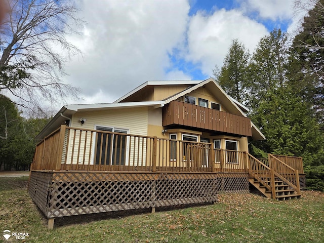 rear view of property with a deck