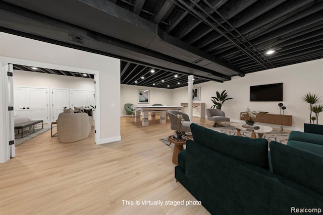 living area with light wood-type flooring, baseboards, and billiards