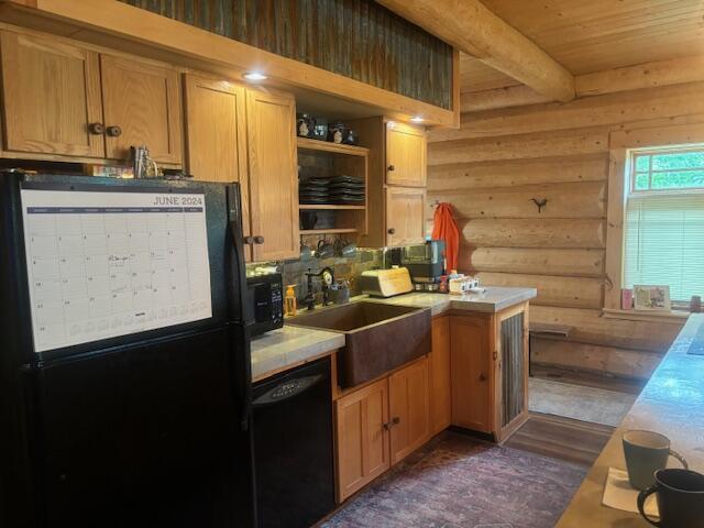 kitchen featuring beam ceiling, black appliances, a sink, open shelves, and light countertops