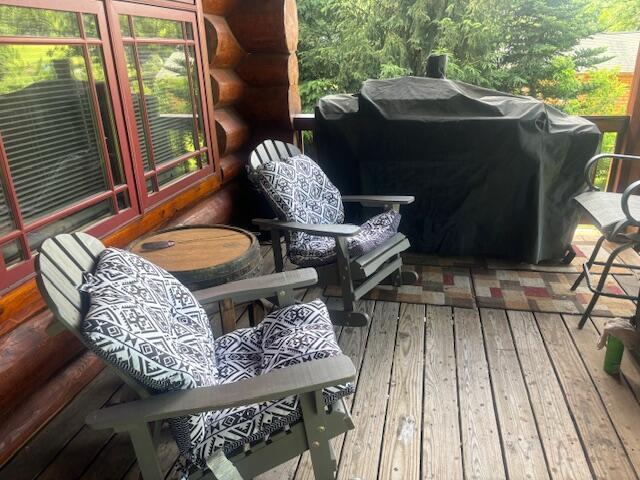 wooden deck with area for grilling