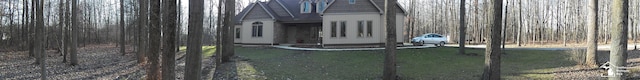 view of property exterior featuring a lawn