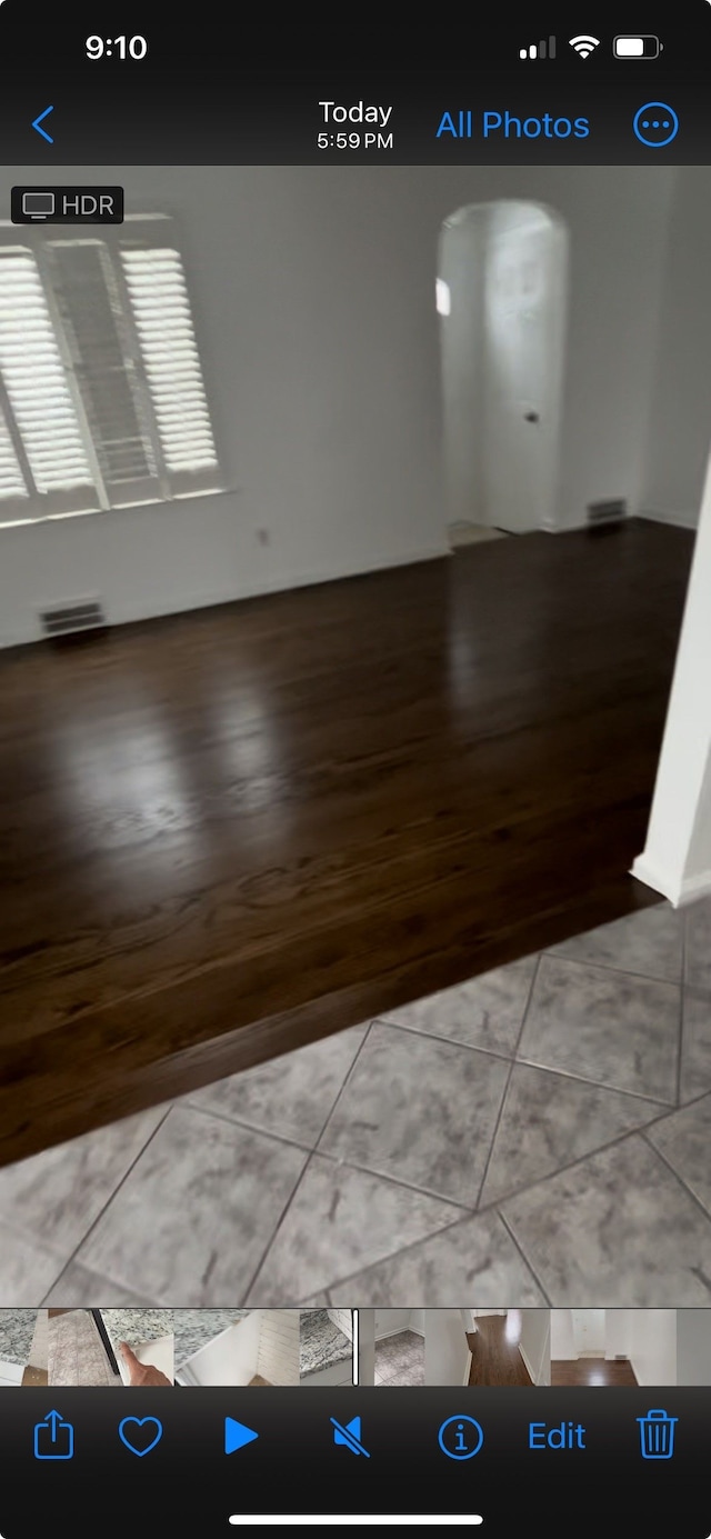 22131 Nevada Ave, Eastpointe, MI 48021 - interior space featuring visible vents, arched walkways, and wood finished floors