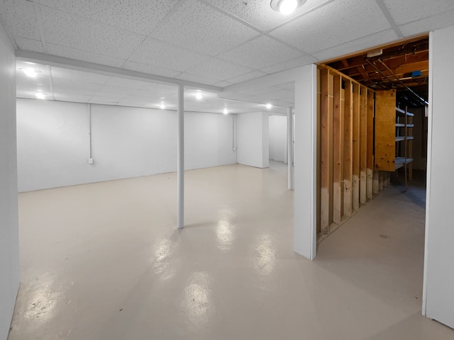 finished basement with a drop ceiling