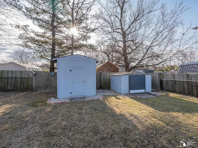 view of shed featuring a fenced backyard