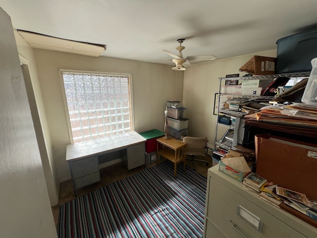 office area with a ceiling fan