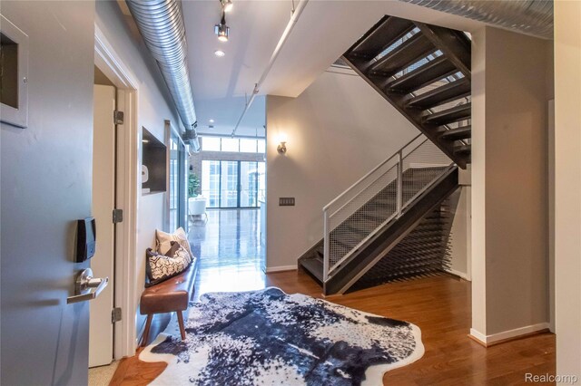 100 N Center St Unit 302, Royal Oak, MI 48067 - entryway featuring wood finished floors and stairs