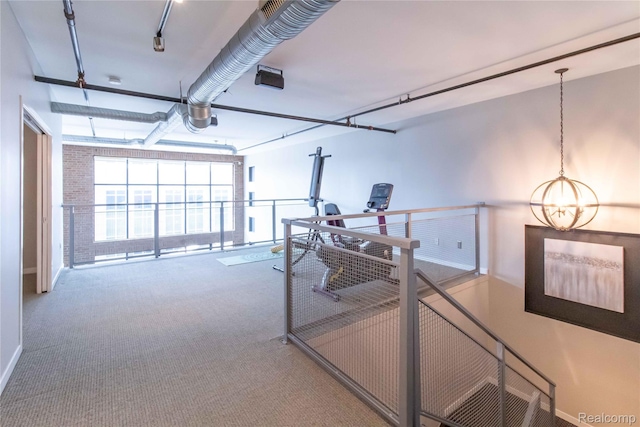 100 N Center St Unit 302, Royal Oak, MI 48067 - hall featuring carpet flooring and a chandelier