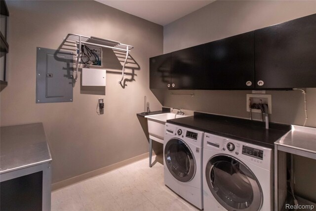 100 N Center St Unit 302, Royal Oak, MI 48067 - laundry room featuring cabinet space, independent washer and dryer, electric panel, and light flooring