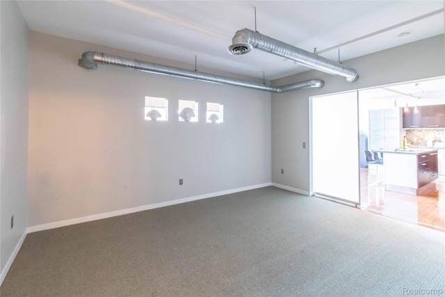 100 N Center St Unit 302, Royal Oak, MI 48067 - garage featuring baseboards
