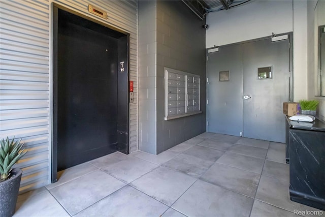 100 N Center St Unit 302, Royal Oak, MI 48067 - view of property's community with mail area and a towering ceiling