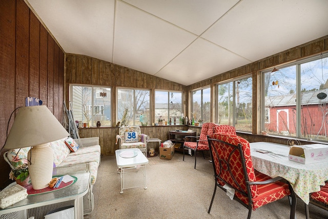 sunroom featuring lofted ceiling