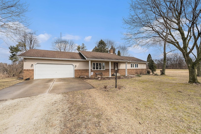 ranch-style house featuring a garage, brick siding, a chimney, and driveway