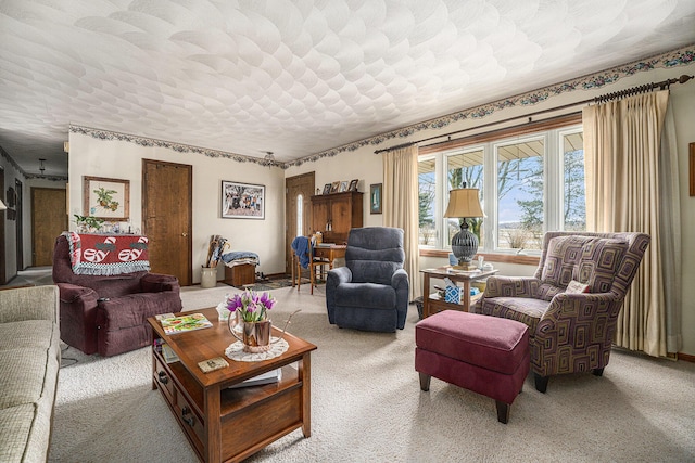 living room with a textured ceiling and carpet