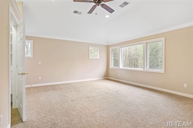 6579 Partridge Ln, Holland, MI 49423 - spare room with ceiling fan, carpet, lofted ceiling, ornamental molding, and baseboards