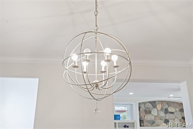 6579 Partridge Ln, Holland, MI 49423 - detailed view of a chandelier and crown molding