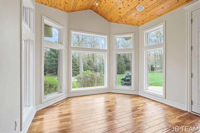 6579 Partridge Ln, Holland, MI 49423 - unfurnished sunroom with vaulted ceiling, wood ceiling, wood finished floors, and baseboards