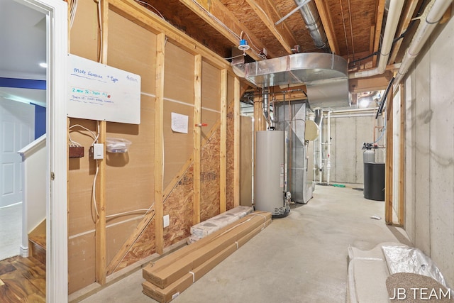 6579 Partridge Ln, Holland, MI 49423 - unfinished below grade area with water heater and a water softener system