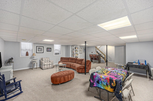 23930 Greenglen Ct, Franklin, MI 48025 - carpeted living area featuring a drop ceiling, baseboards, and stairs