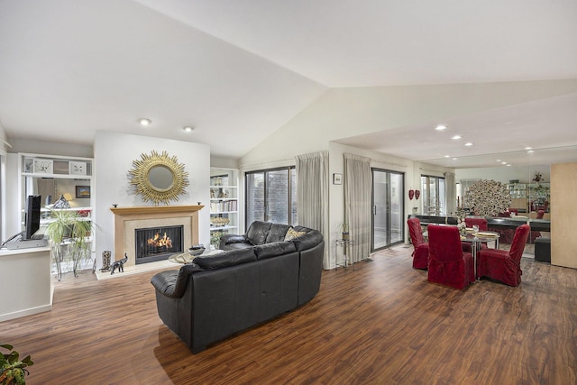 23930 Greenglen Ct, Franklin, MI 48025 - living area featuring recessed lighting, wood finished floors, a fireplace, and vaulted ceiling