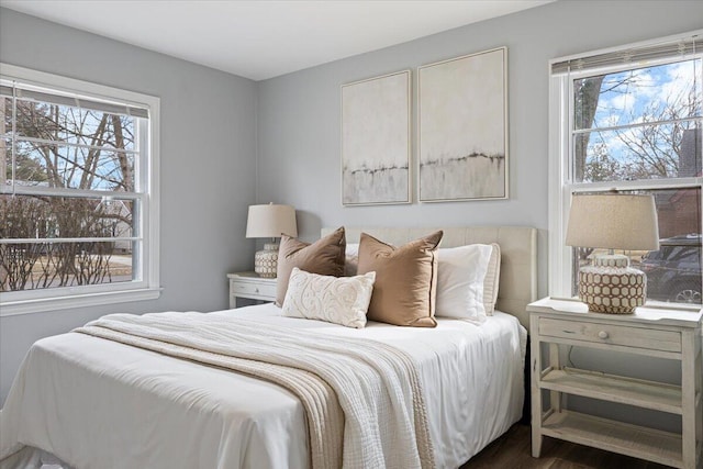 bedroom with wood finished floors