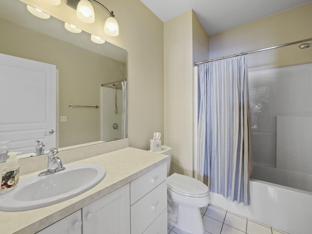 bathroom featuring vanity, shower / bath combination with curtain, toilet, and tile patterned floors