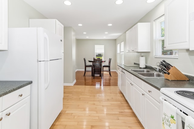 537 Andresen Ct, Hazel Park, MI 48030 - kitchen featuring a sink, white appliances, light wood finished floors, plenty of natural light, and recessed lighting