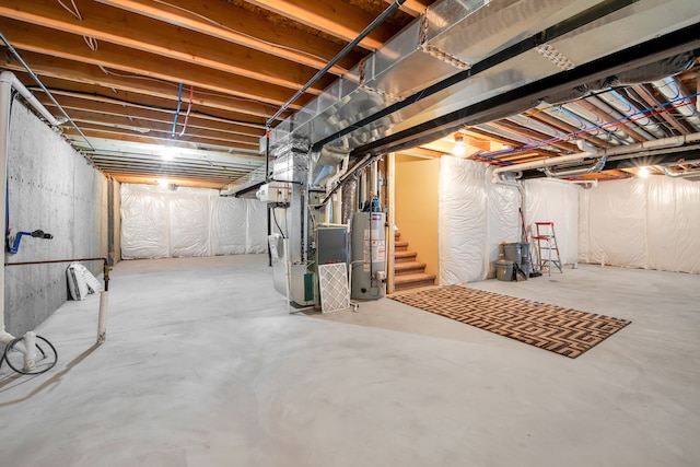259 Victoria Dr, Dexter, MI 48130 - unfinished basement featuring stairs, water heater, and heating unit