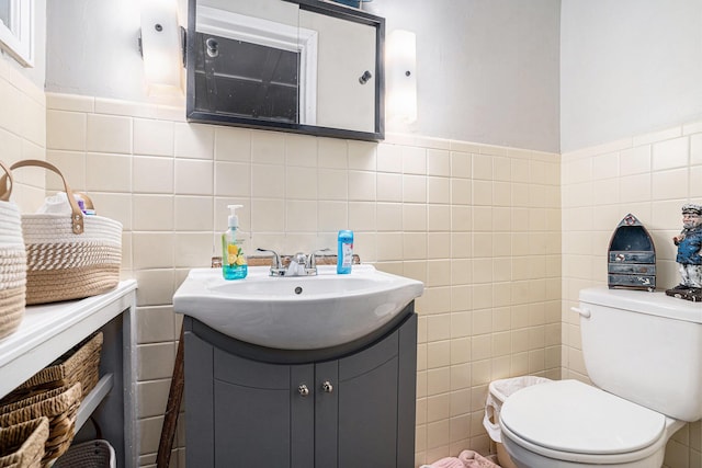 28 Orchard Pl, Battle Creek, MI 49017 - half bath with tile walls, toilet, and vanity