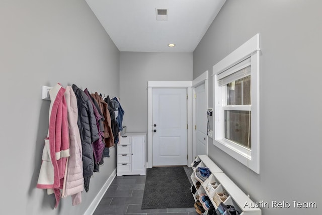 mudroom with visible vents and baseboards