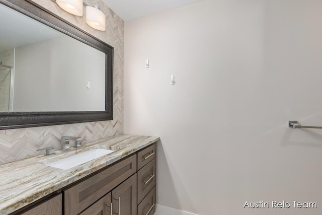 bathroom featuring backsplash and vanity