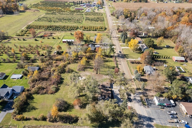 birds eye view of property featuring a rural view