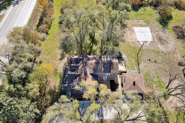 drone / aerial view with a view of trees