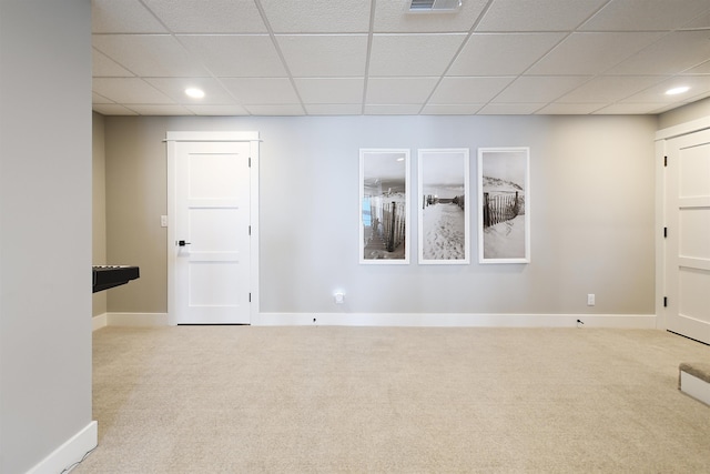 interior space featuring recessed lighting, a paneled ceiling, baseboards, and carpet floors