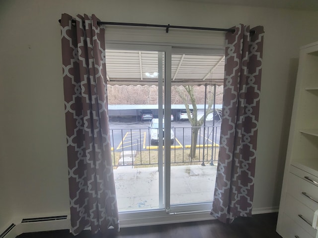 doorway featuring a baseboard radiator